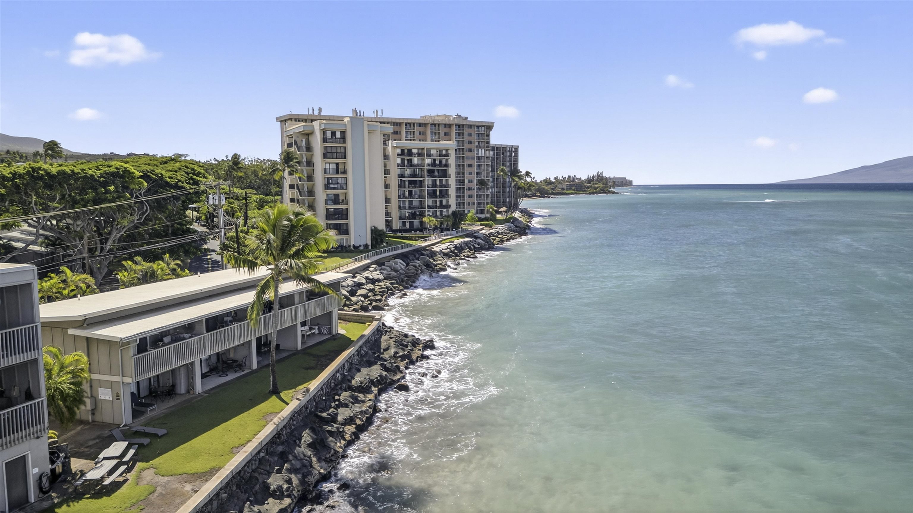 4435 Lower Honoapiilani Road, Unit 111 Lahaina, HI 96761 - Photo 2 of 50 a view of a tall building with a city view
