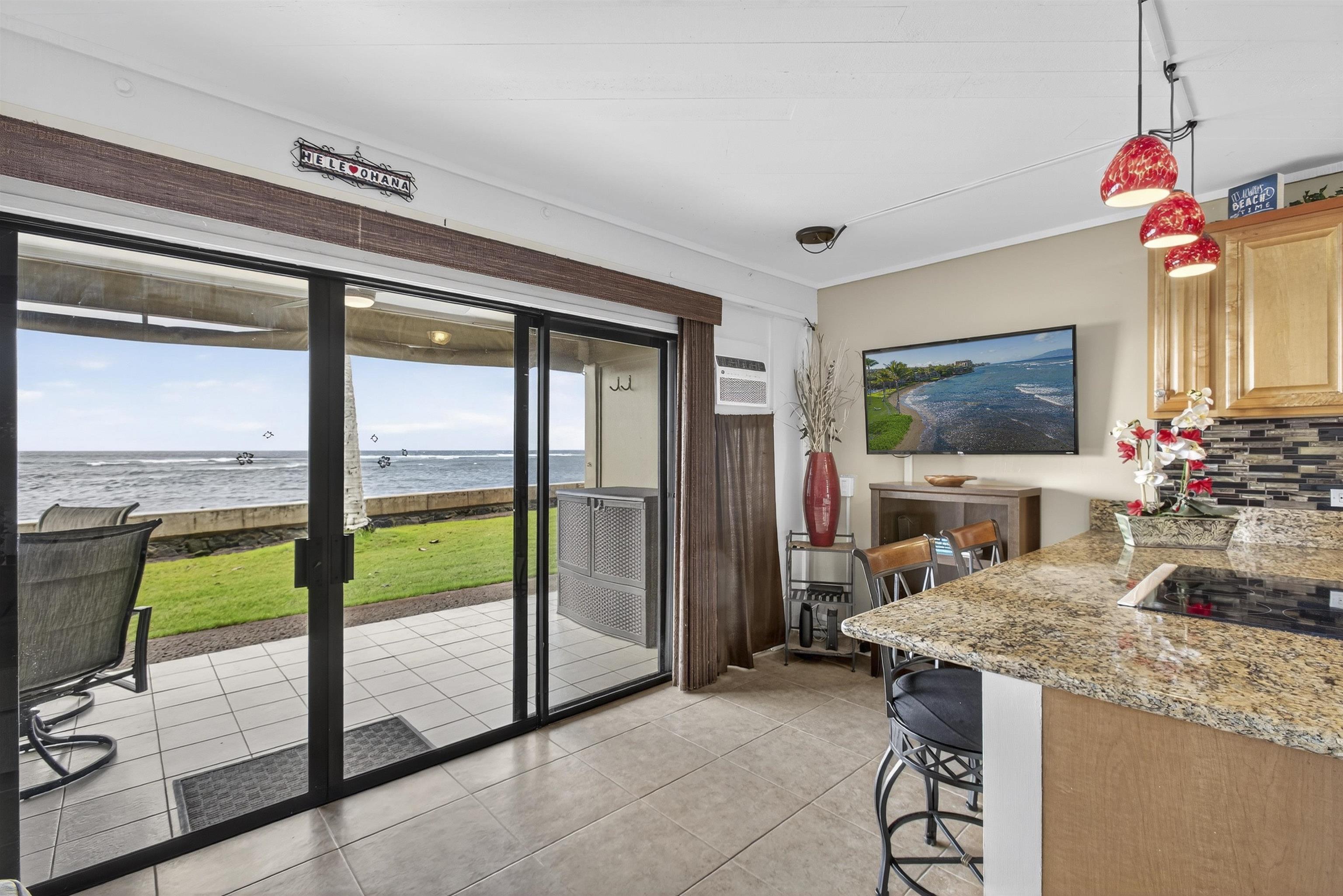 4435 Lower Honoapiilani Road, Unit 111 Lahaina, HI 96761 - Photo 22 of 50 a view of a living room and a balcony