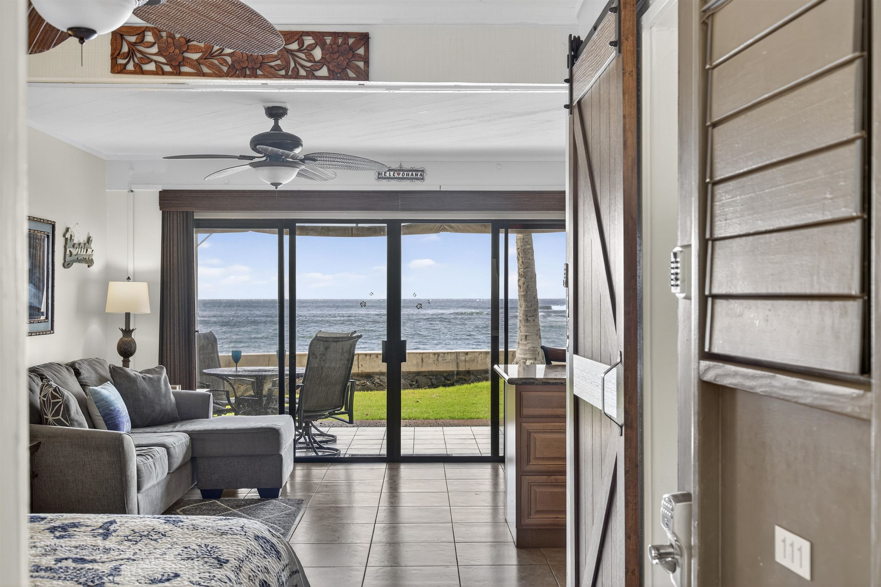 4435 Lower Honoapiilani Road, Unit 111 Lahaina, HI 96761 - Photo 3 of 50 a living room with furniture