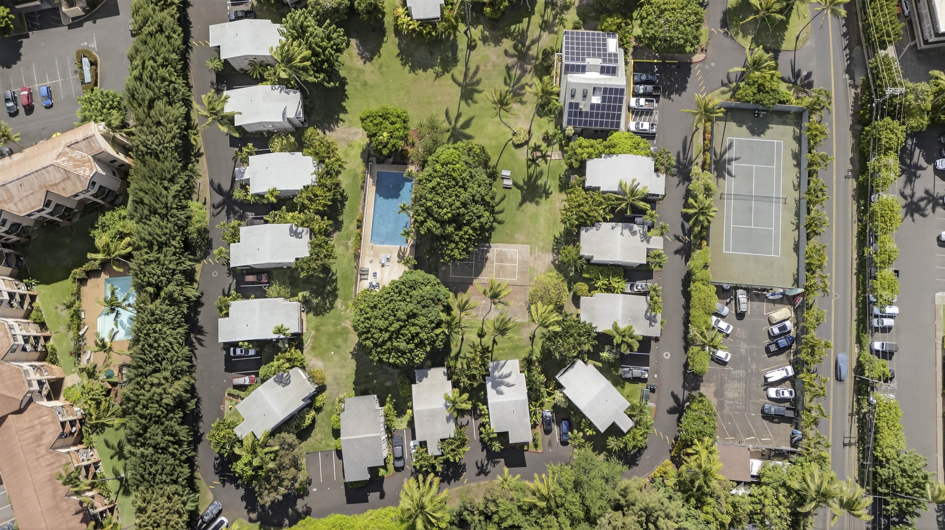4435 Lower Honoapiilani Road, Unit 111 Lahaina, HI 96761 - Photo 41 of 50 an aerial view of residential house with outdoor space and trees all around