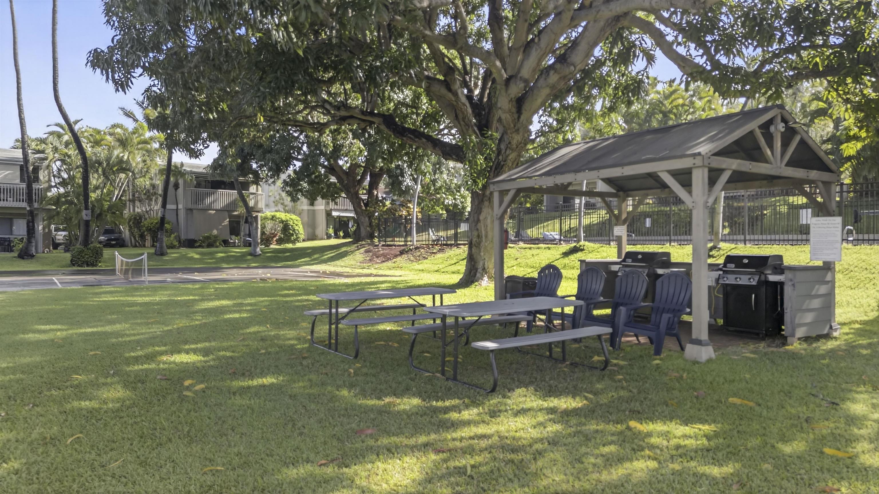 4435 Lower Honoapiilani Road, Unit 111 Lahaina, HI 96761 - Photo 47 of 50 a view of a swimming pool with a patio