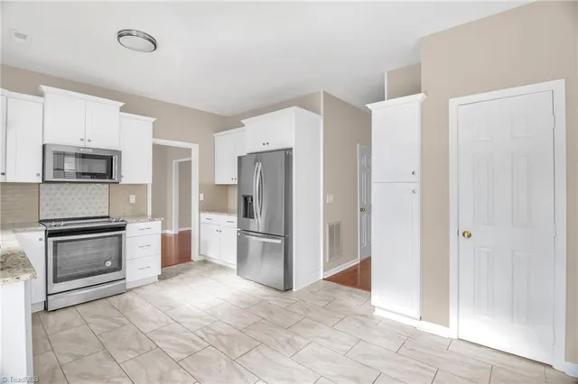 $395,000 | 3417 Derbywood Drive, Greensboro, NC 27410