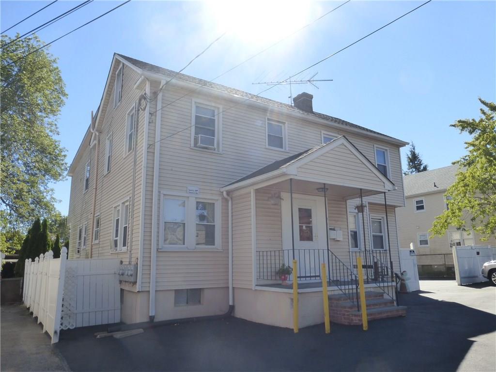 20 Corbo Terrace Stamford, CT 06902 - Photo 1 of 1 a front view of a house with a yard