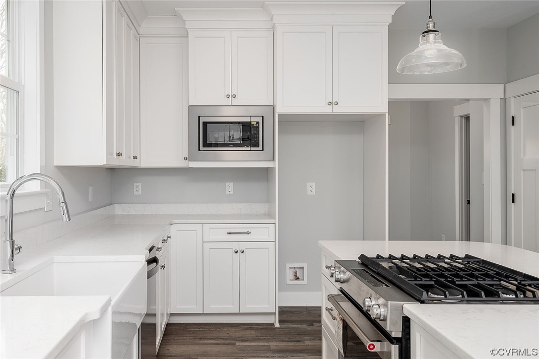 3154 Cider House Road Toano, VA 23168 - Photo 14 of 36 a kitchen with granite countertop white cabinets and stainless steel appliances