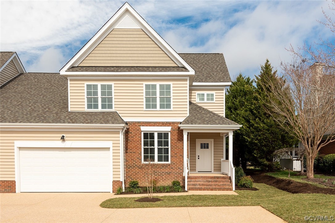 3154 Cider House Road Toano, VA 23168 - Photo 2 of 36 a front view of a house with a yard