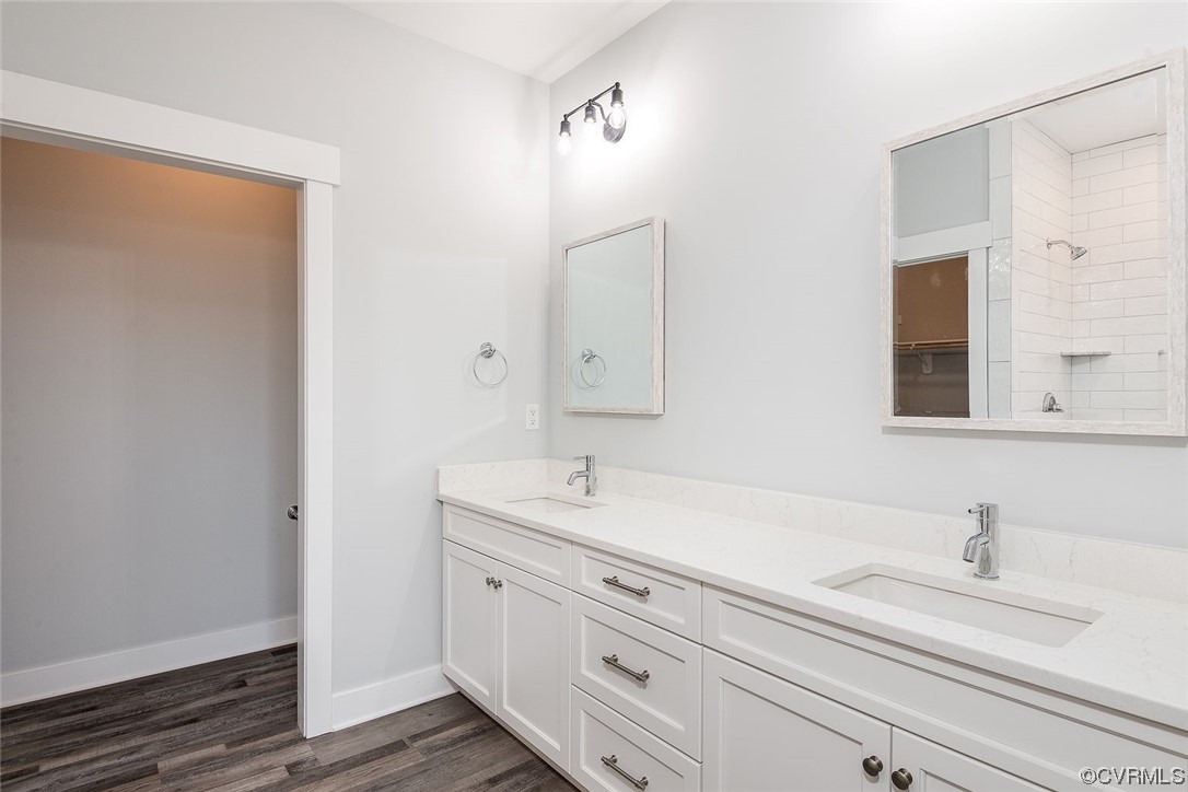 3154 Cider House Road Toano, VA 23168 - Photo 23 of 36 a bathroom with a sink and a mirror