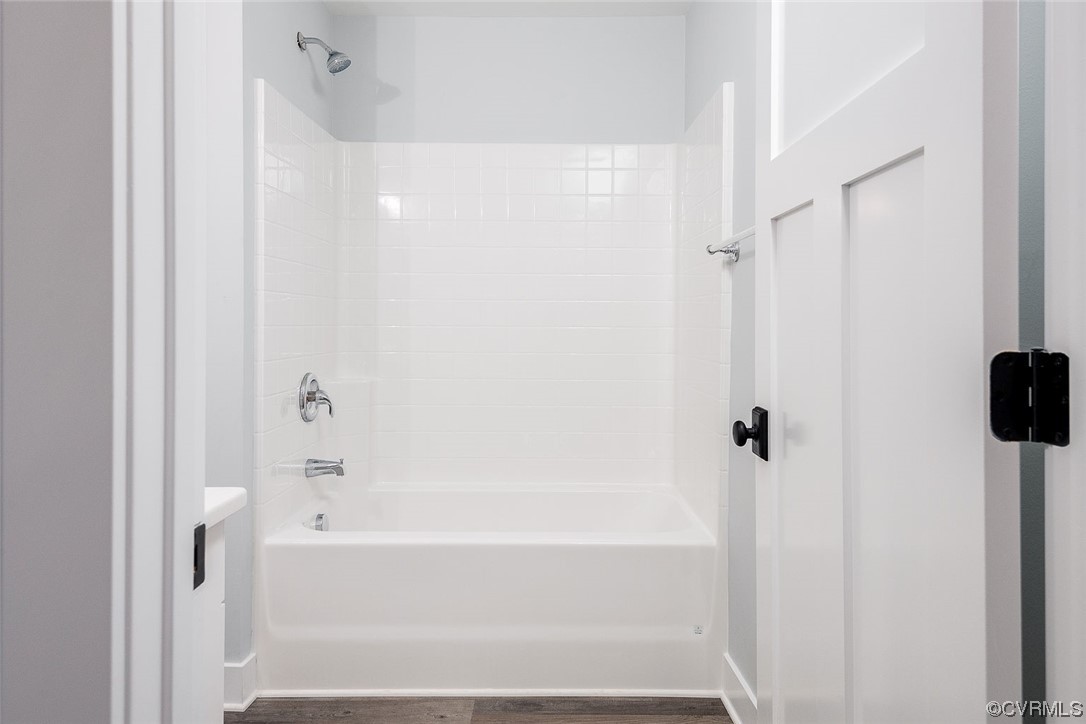 3154 Cider House Road Toano, VA 23168 - Photo 31 of 36 a bathroom with a bathtub and a shower