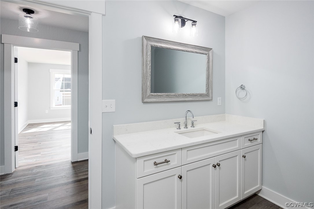 3154 Cider House Road Toano, VA 23168 - Photo 32 of 36 a bathroom with a sink vanity and a mirror