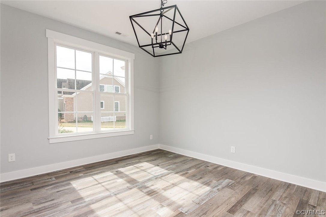 3154 Cider House Road Toano, VA 23168 - Photo 6 of 36 an empty room with a window