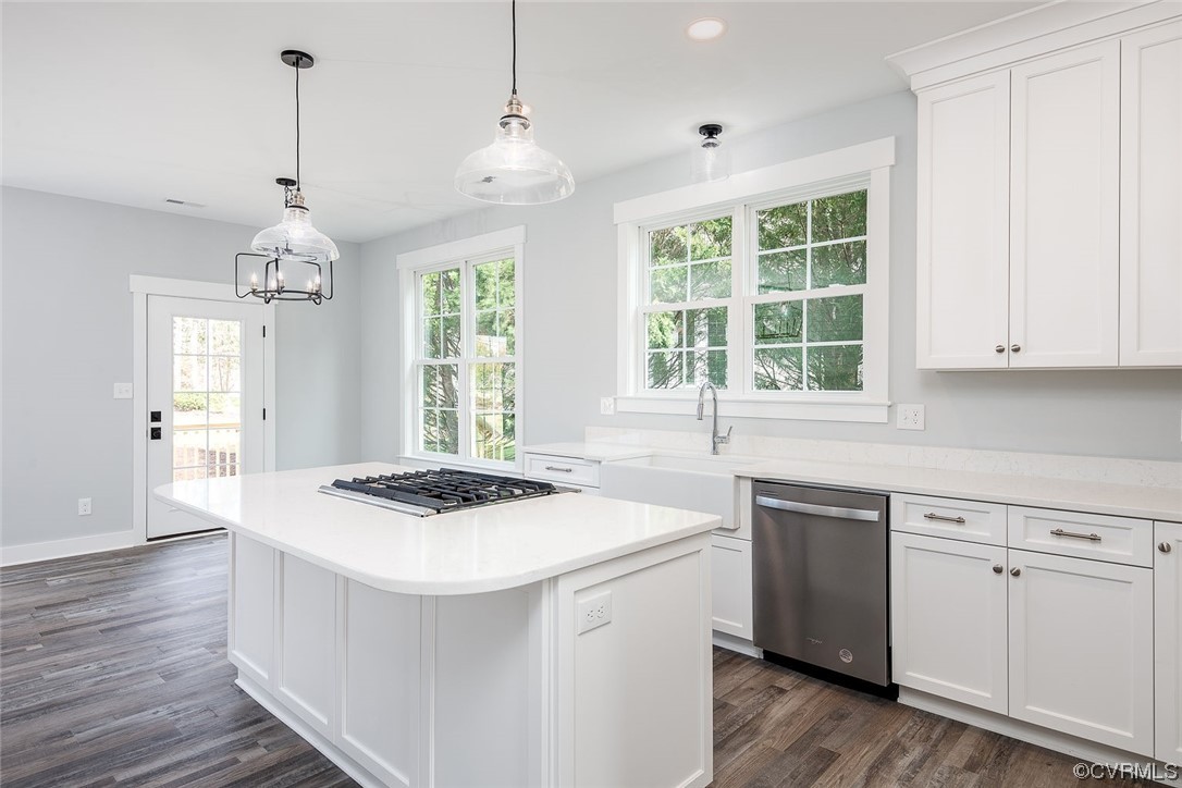 3154 Cider House Road Toano, VA 23168 - Photo 10 of 36 a kitchen that has a sink a window and cabinets