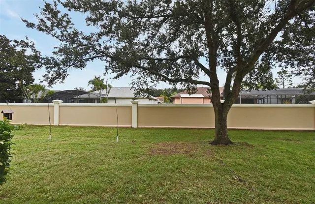 front view of a house with a garden