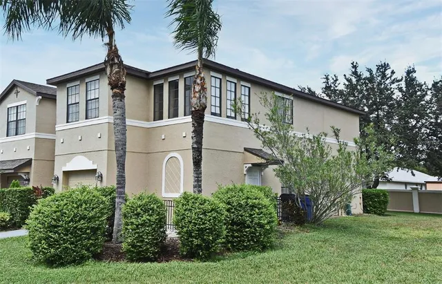 front view of a house with a yard