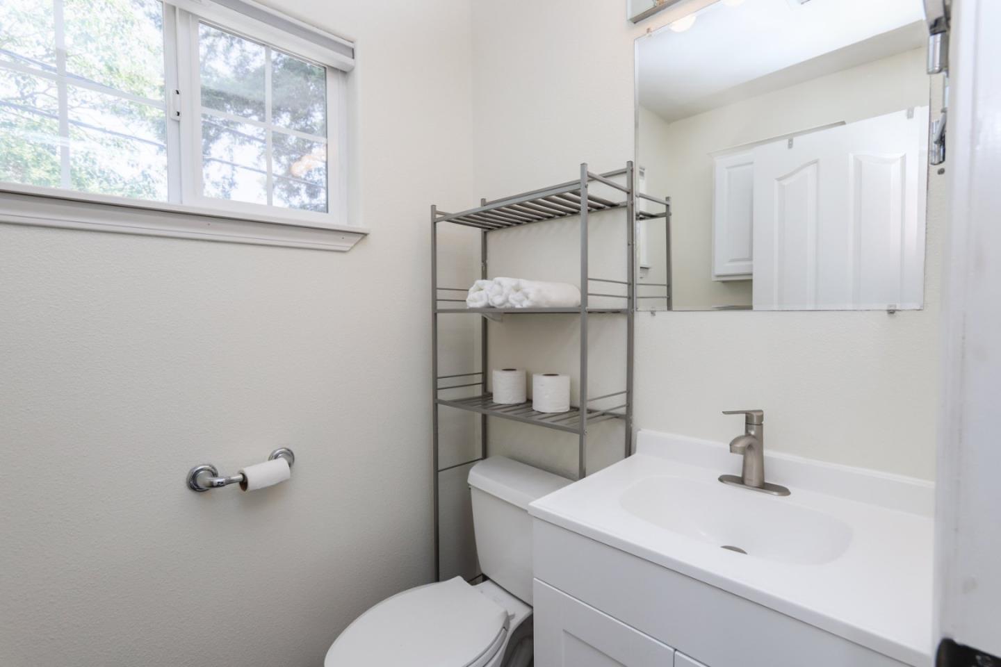 60 Monte Vista Way Gilroy, CA 95020 - Photo 22 of 33 a bathroom with a sink toilet and mirror