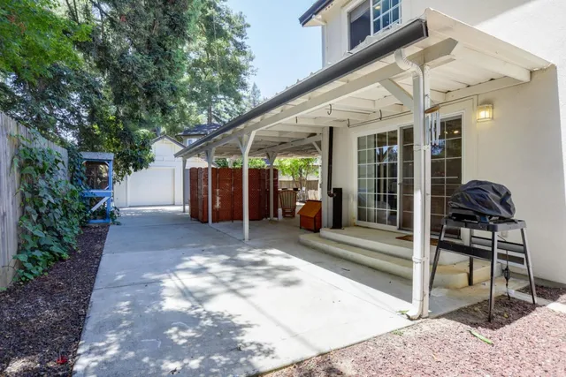 an aerial view of a house with garden space