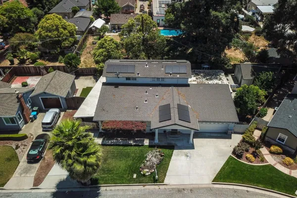 an aerial view of a house with garden space