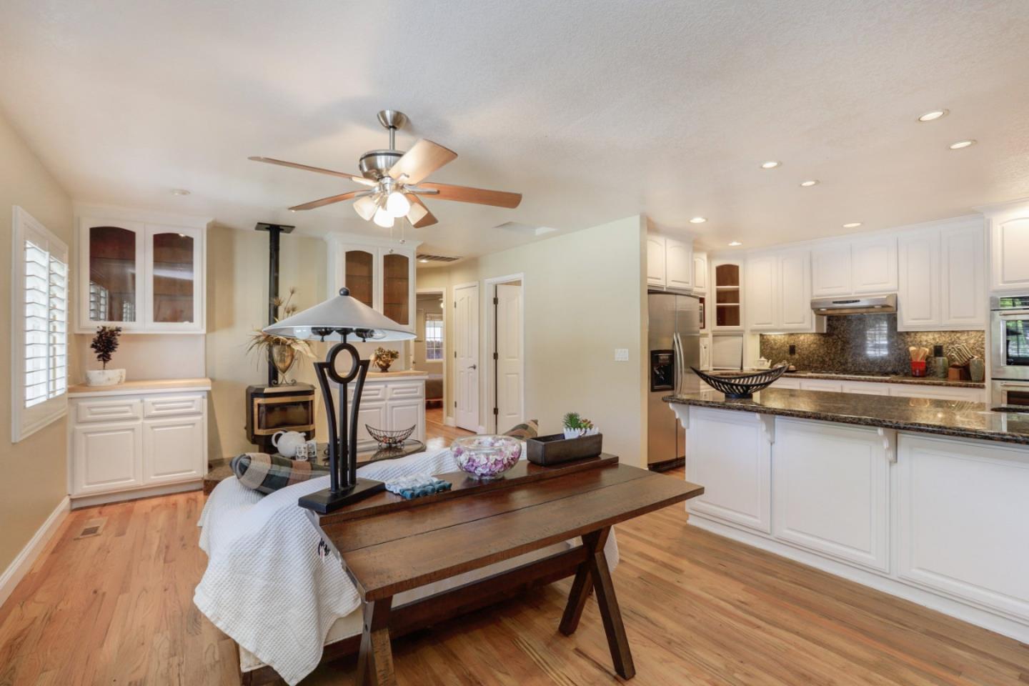 60 Monte Vista Way Gilroy, CA 95020 - Photo 3 of 33 a view of a dining room with furniture and a chandelier fan