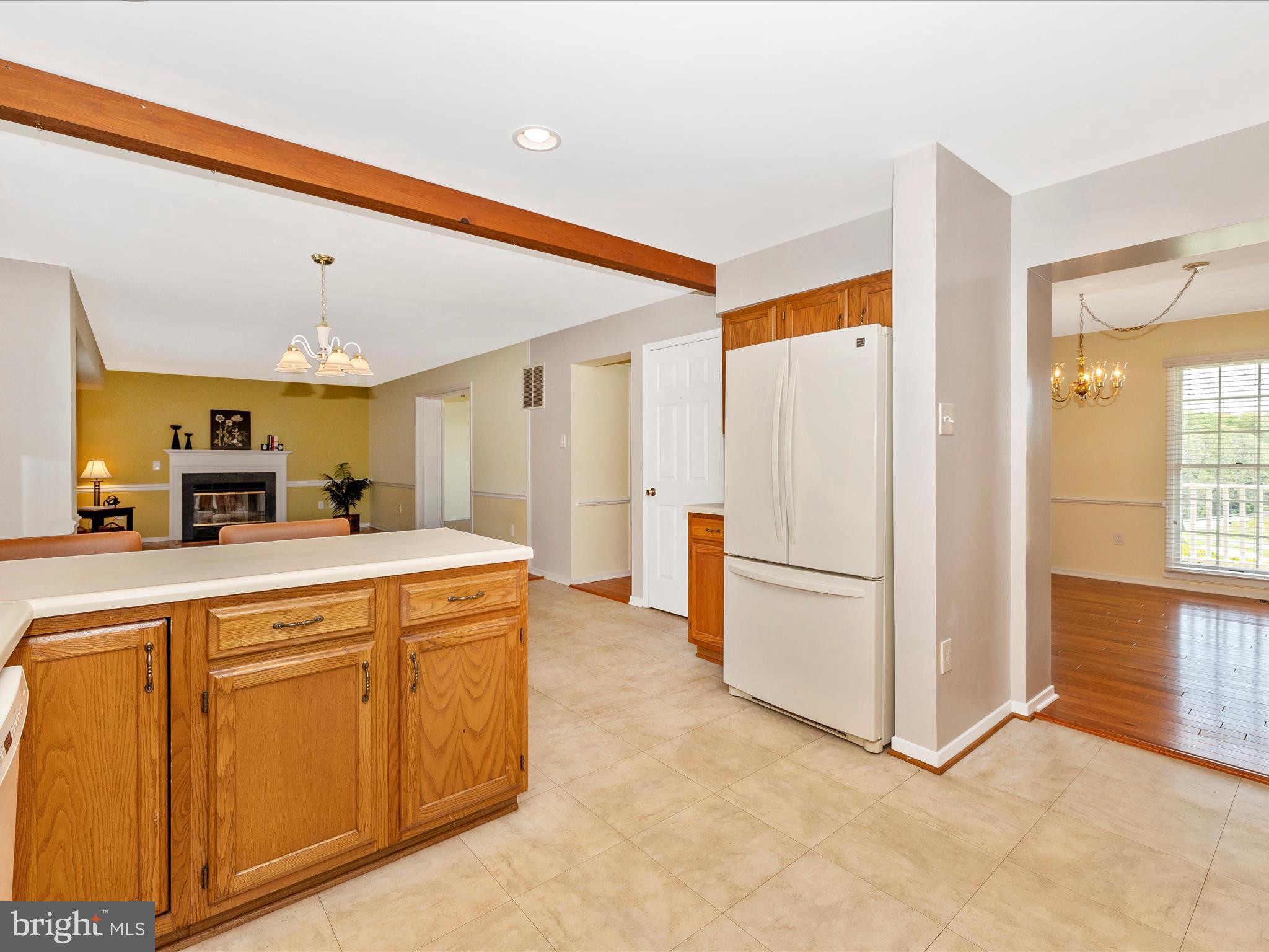 4503 Bartholows Road Mount Airy, MD 21771 - Photo 18 of 65 a kitchen with stainless steel appliances a refrigerator and a stove top oven