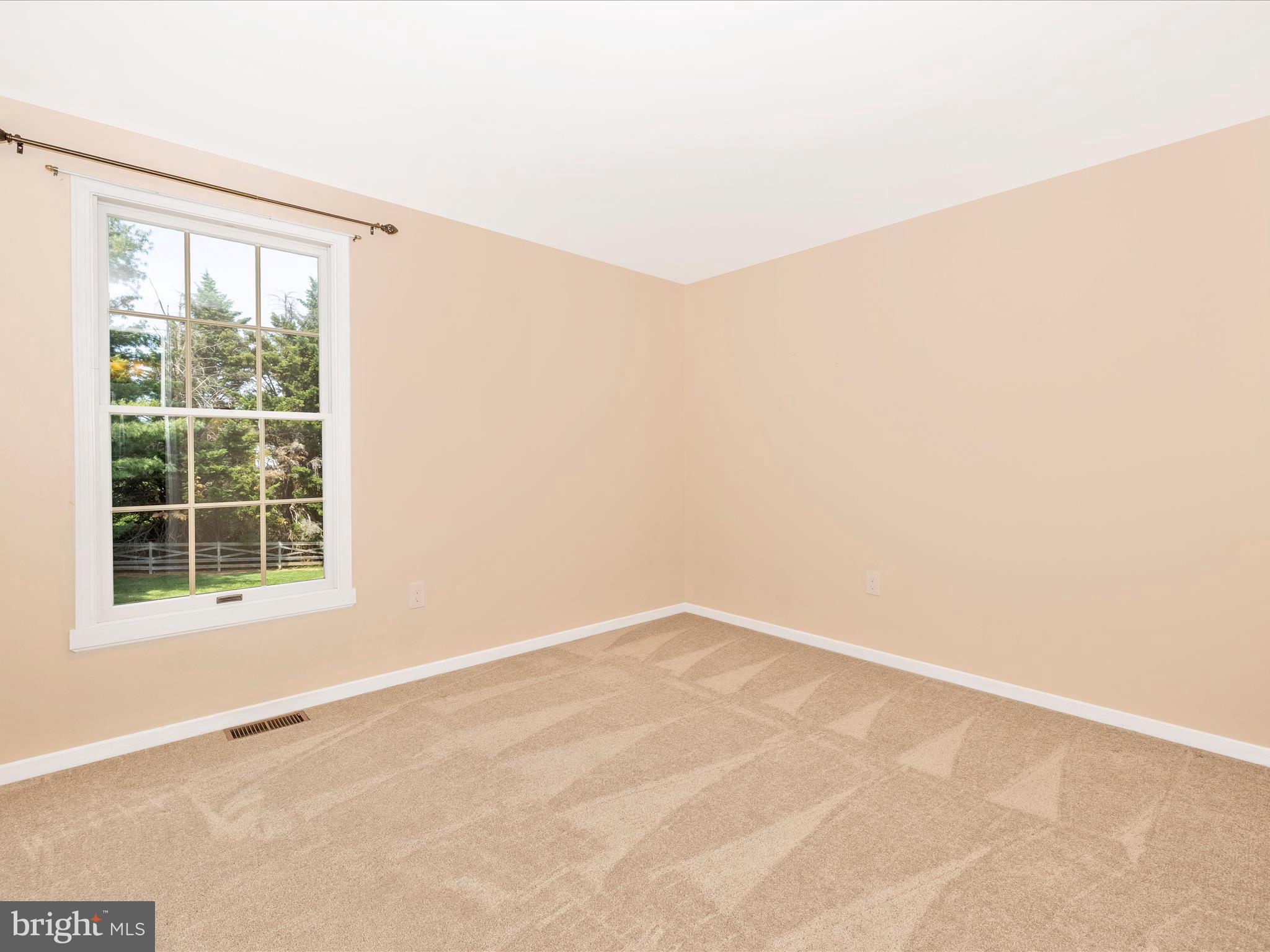 4503 Bartholows Road Mount Airy, MD 21771 - Photo 33 of 65 an empty room with a window