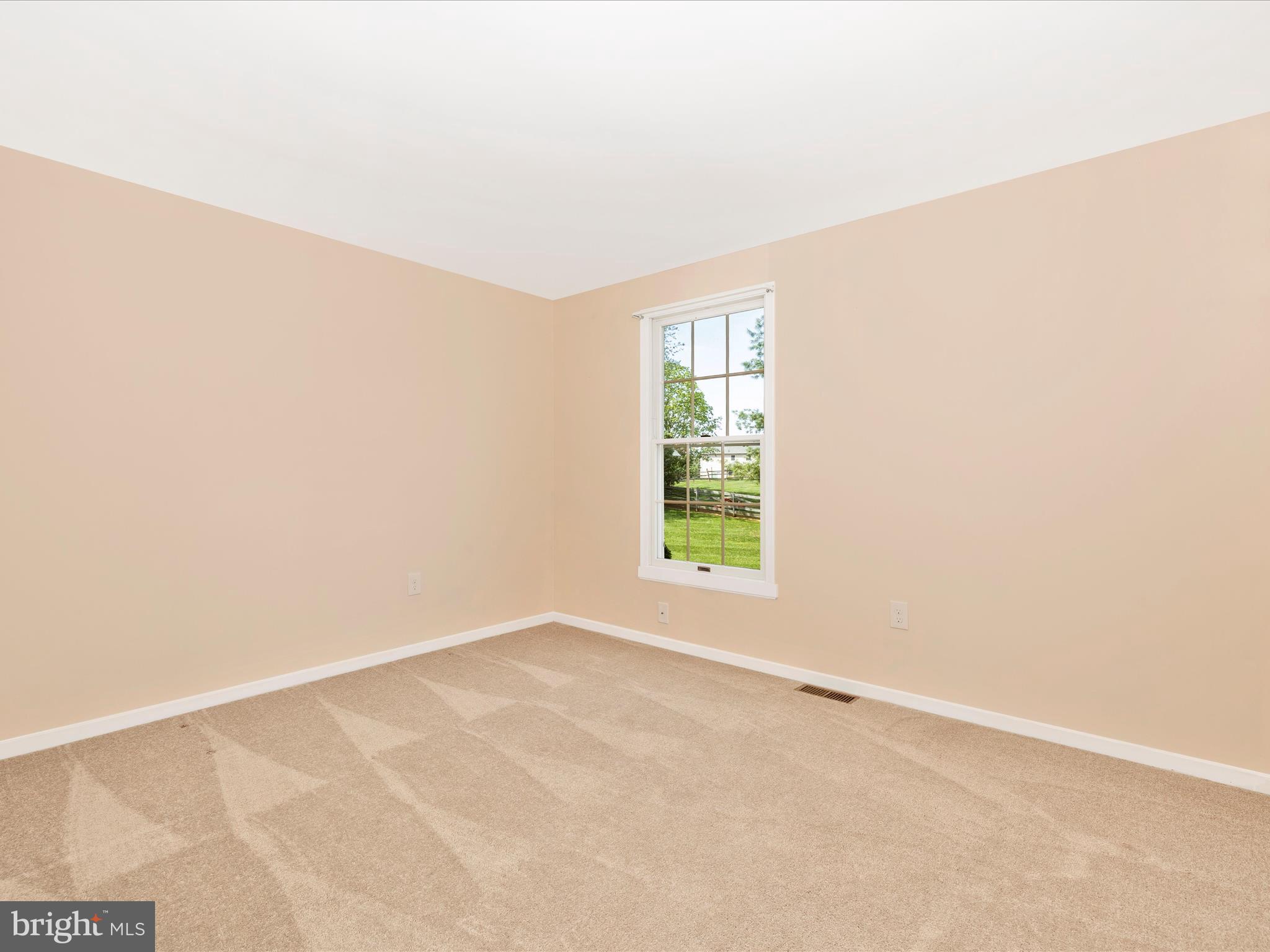 4503 Bartholows Road Mount Airy, MD 21771 - Photo 35 of 65 an empty room with a window