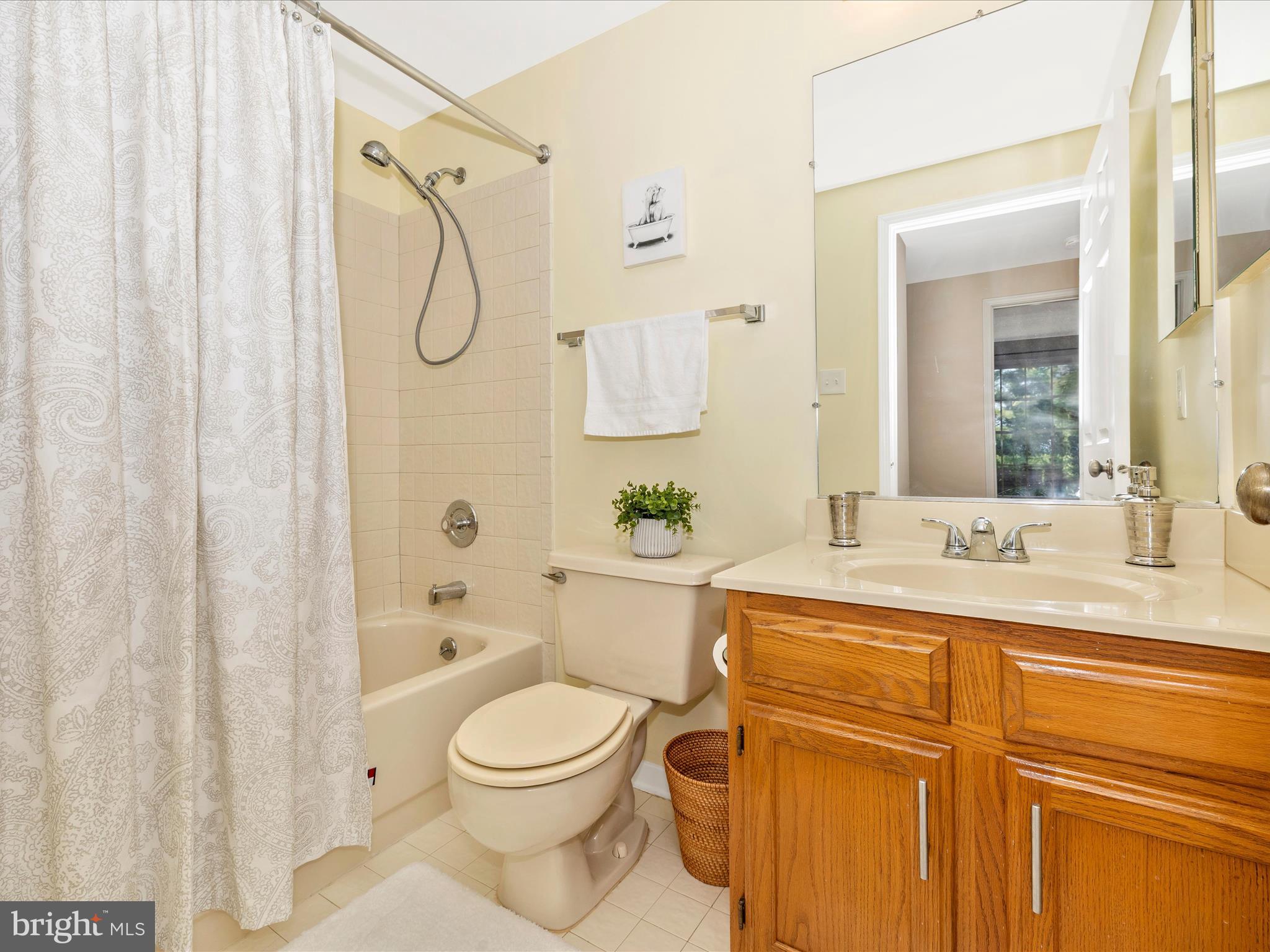 4503 Bartholows Road Mount Airy, MD 21771 - Photo 39 of 65 a bathroom with a granite countertop sink mirror vanity and toilet
