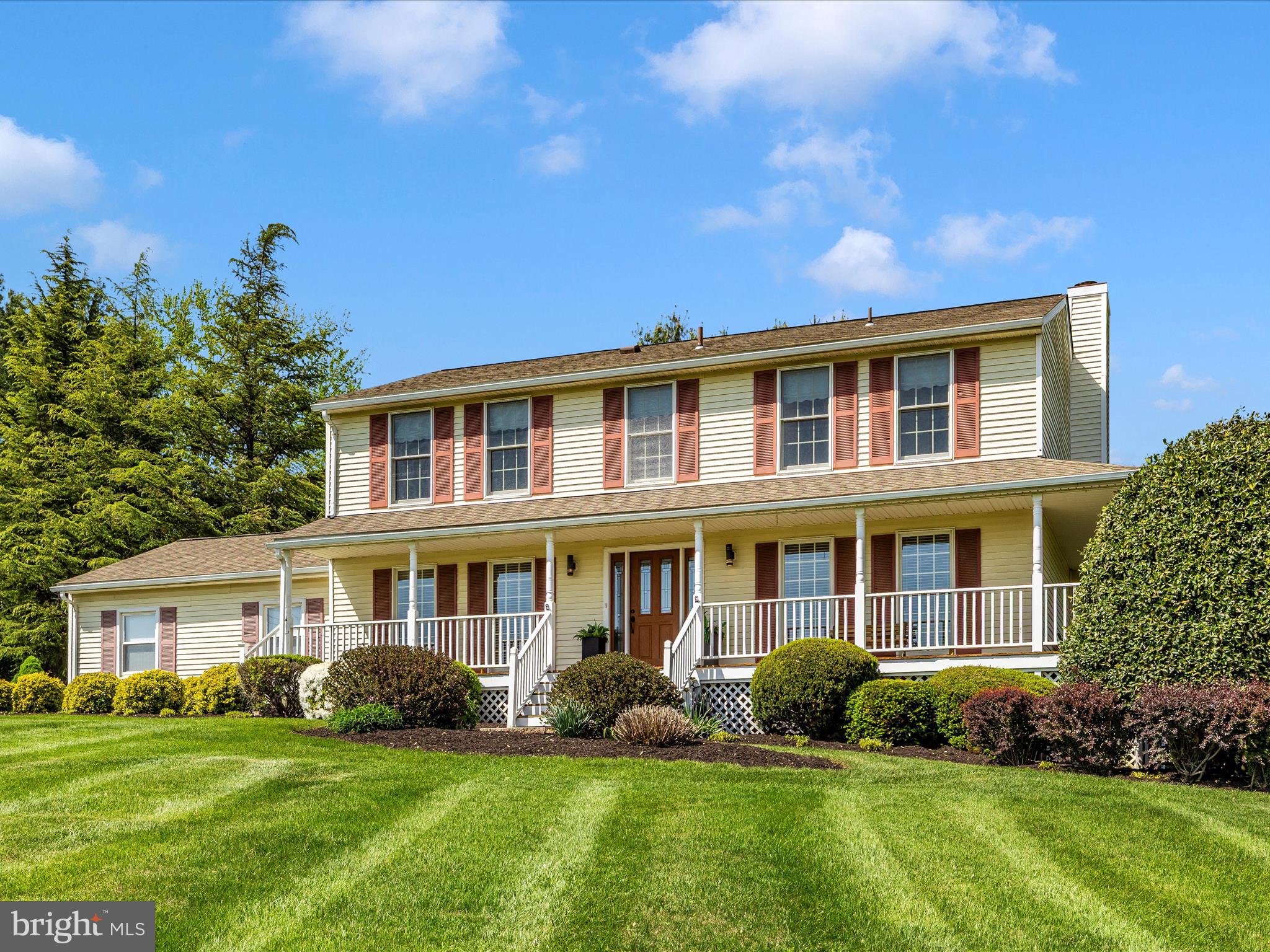 4503 Bartholows Road Mount Airy, MD 21771 - Photo 48 of 65 a front view of a house with a yard