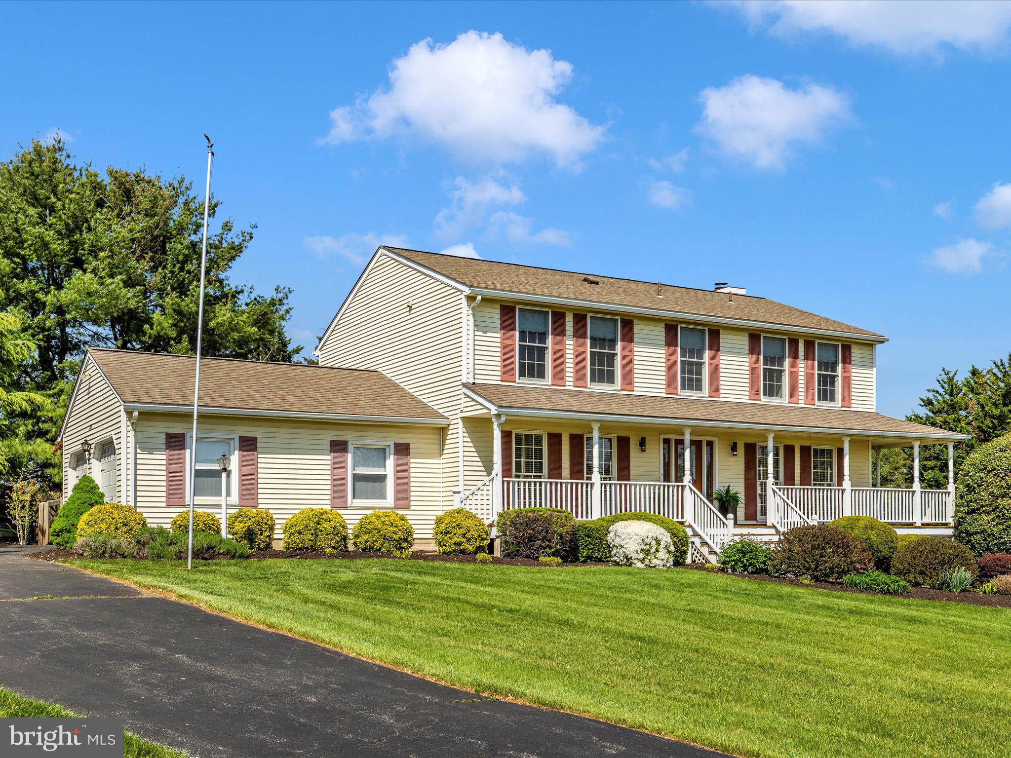 4503 Bartholows Road Mount Airy, MD 21771 - Photo 49 of 65 a front view of a house with a garden