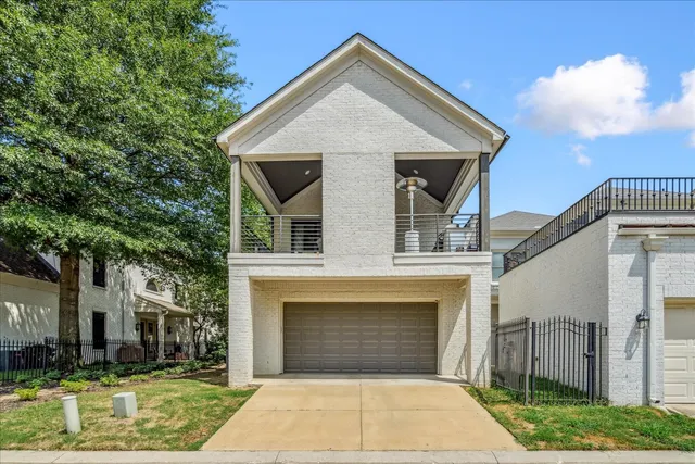 a front view of a house with yard