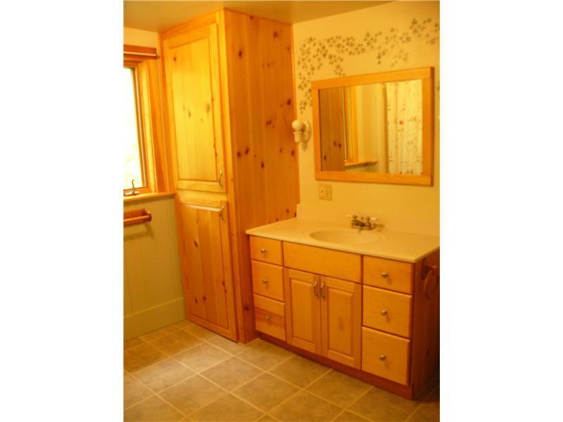 683 Sandy River Road Kents Hill, ME 04349 - Photo 22 of 35 Bathroom. The ceramic floor tiles...