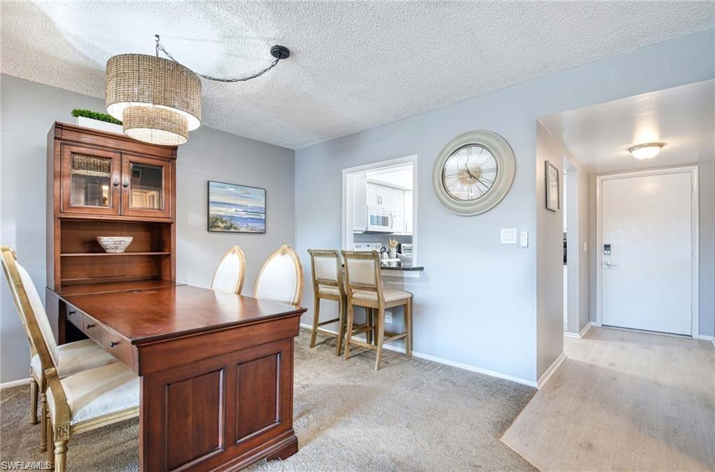 5651 Rattlesnake Hamm Road, Unit C201 Naples, FL 34110 - Photo 3 of 17