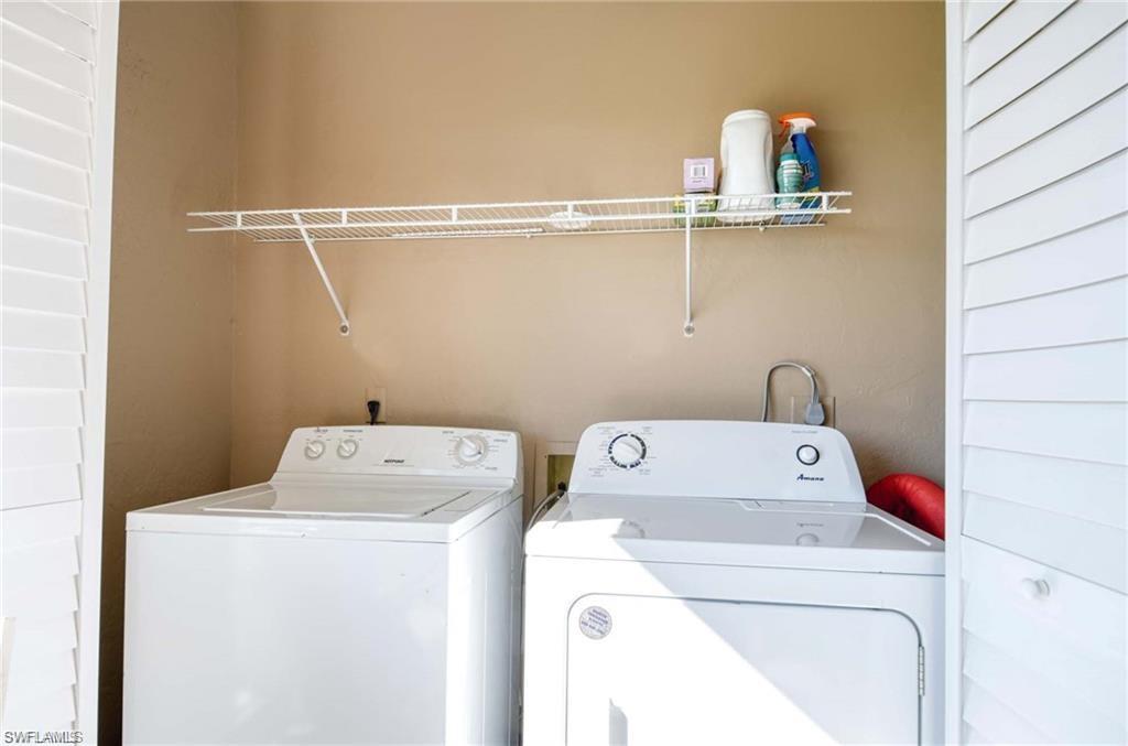5651 Rattlesnake Hamm Road, Unit C201 Naples, FL 34110 - Photo 7 of 17 Laundry Area