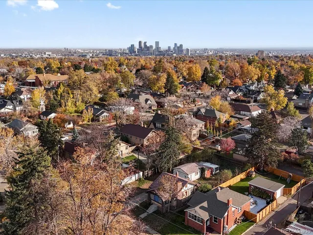 an aerial view of residential house and outdoor space