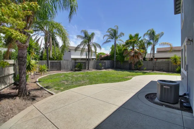 a view of a backyard with a garden