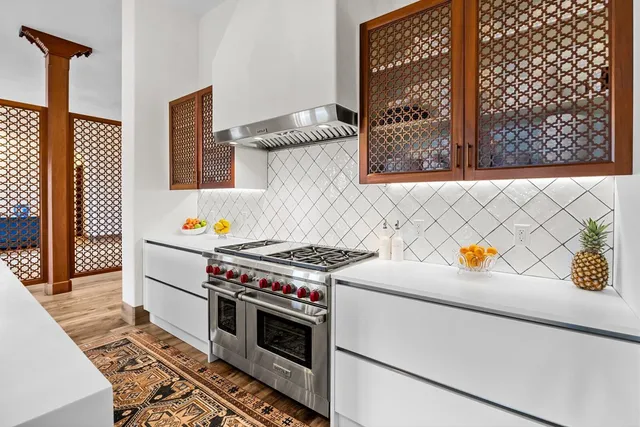 a bedroom with a bed window and a table