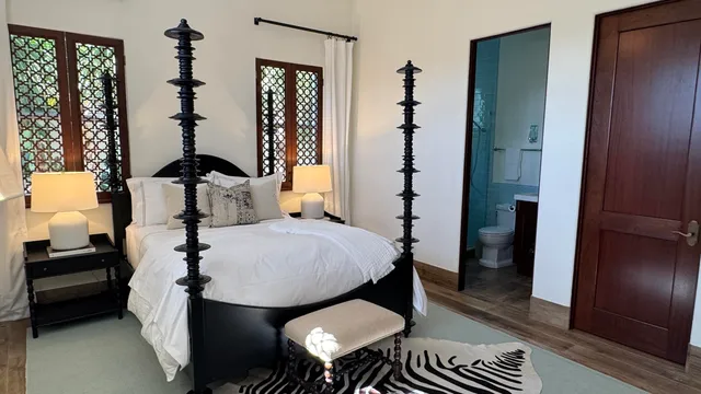a view of kitchen with furniture and wooden floor