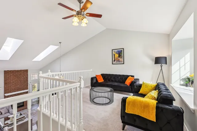 a living room with furniture and a table