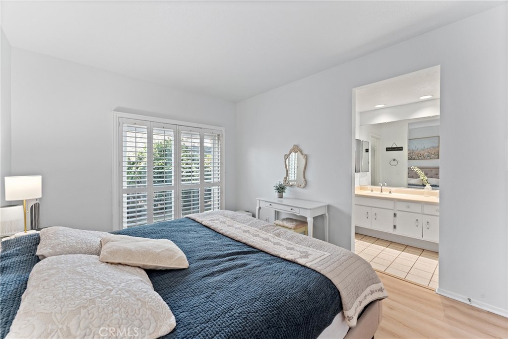 1340 Glenwood Road, Unit 28 Glendale, CA 91201 - Photo 21 of 36 a bedroom with a bed and a couch