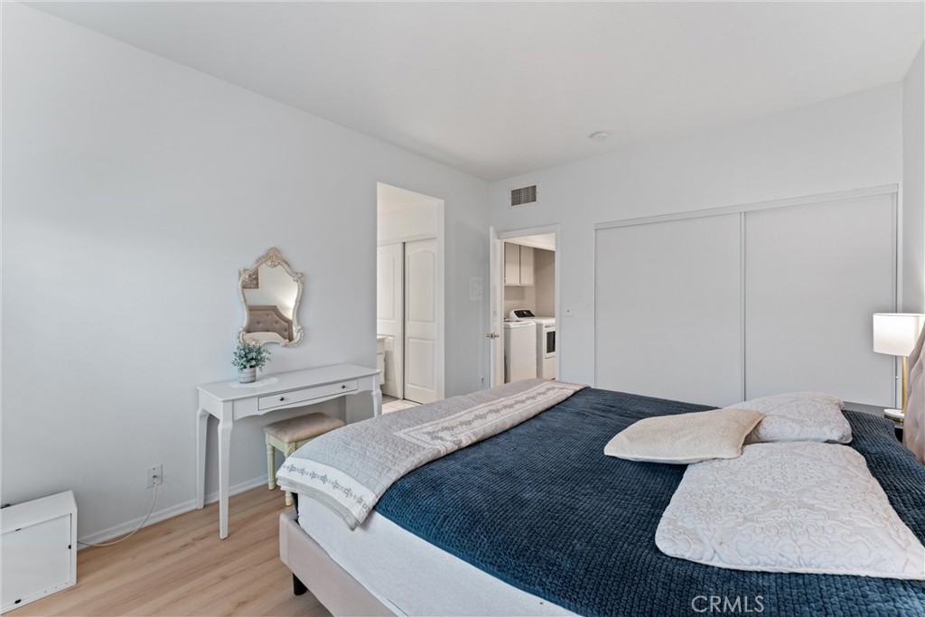 1340 Glenwood Road, Unit 28 Glendale, CA 91201 - Photo 22 of 36 a bedroom with a bed and a table