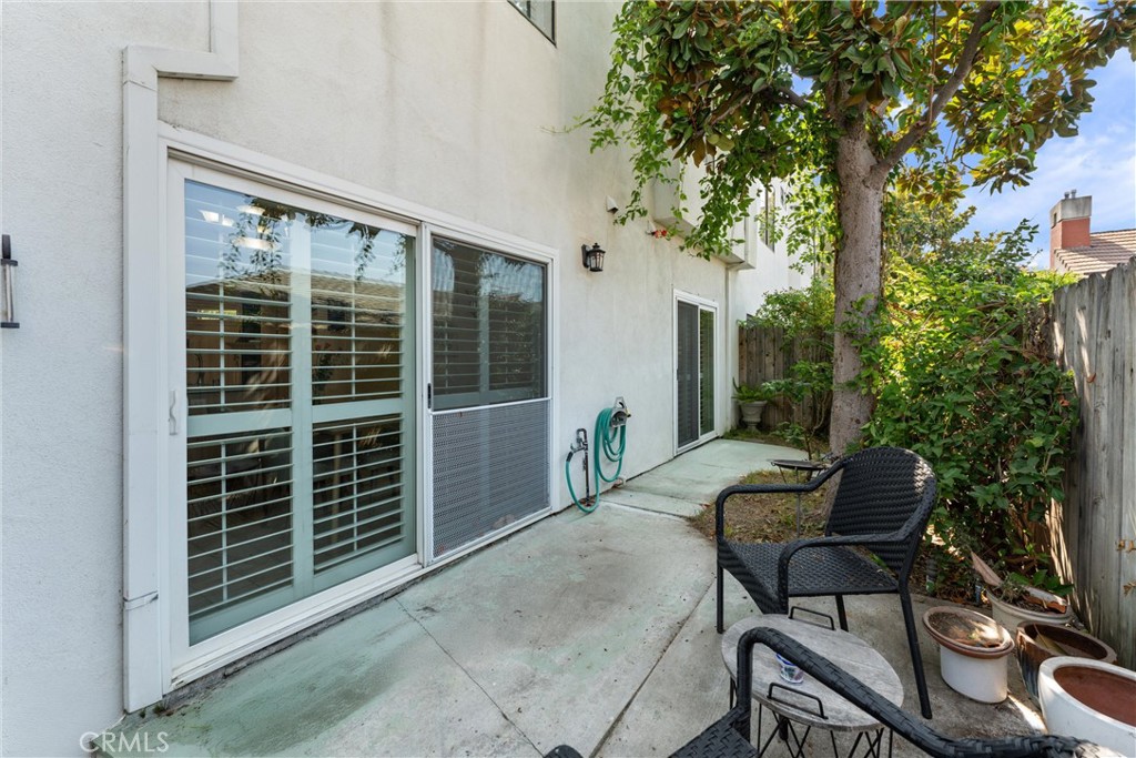 1340 Glenwood Road, Unit 28 Glendale, CA 91201 - Photo 29 of 36 a view of chair and table in the patio