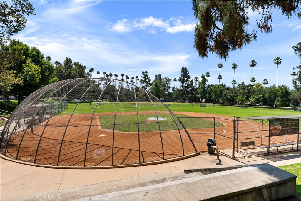 1340 Glenwood Road, Unit 28 Glendale, CA 91201 - Photo 31 of 36 a view of a tennis ground with large trees