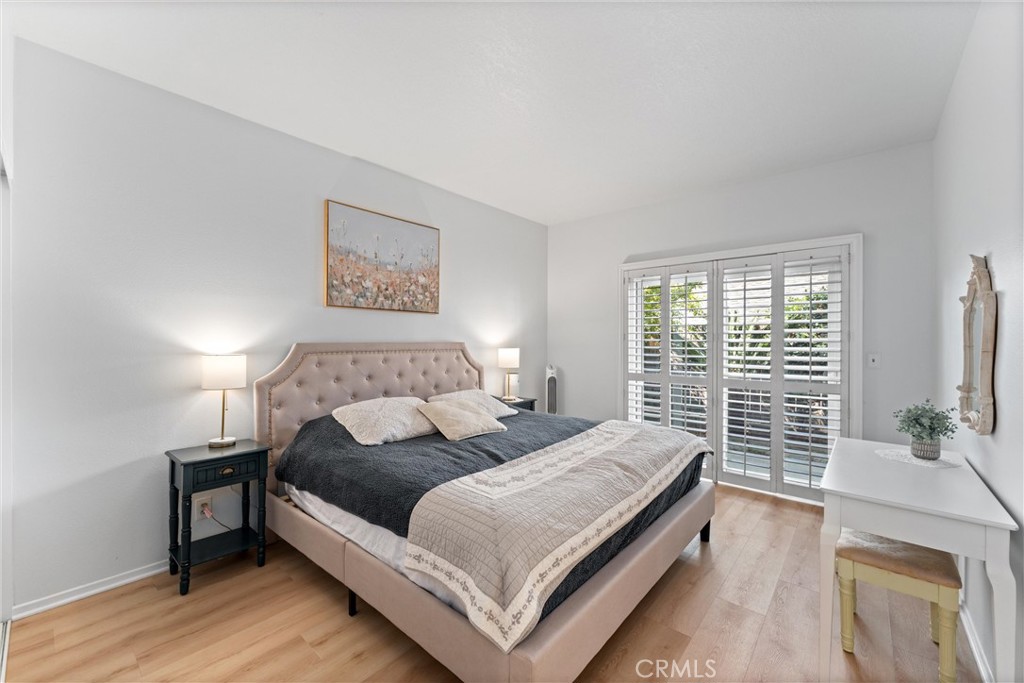 1340 Glenwood Road, Unit 28 Glendale, CA 91201 - Photo 6 of 36 a spacious bedroom with a bed and a flat screen tv
