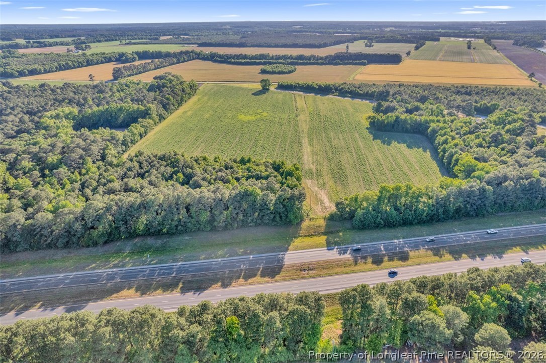 0 Pope Wray (lot 2) Road Turkey, NC 28393 - Photo 17 of 22 an aerial view of a house with a yard and lake view