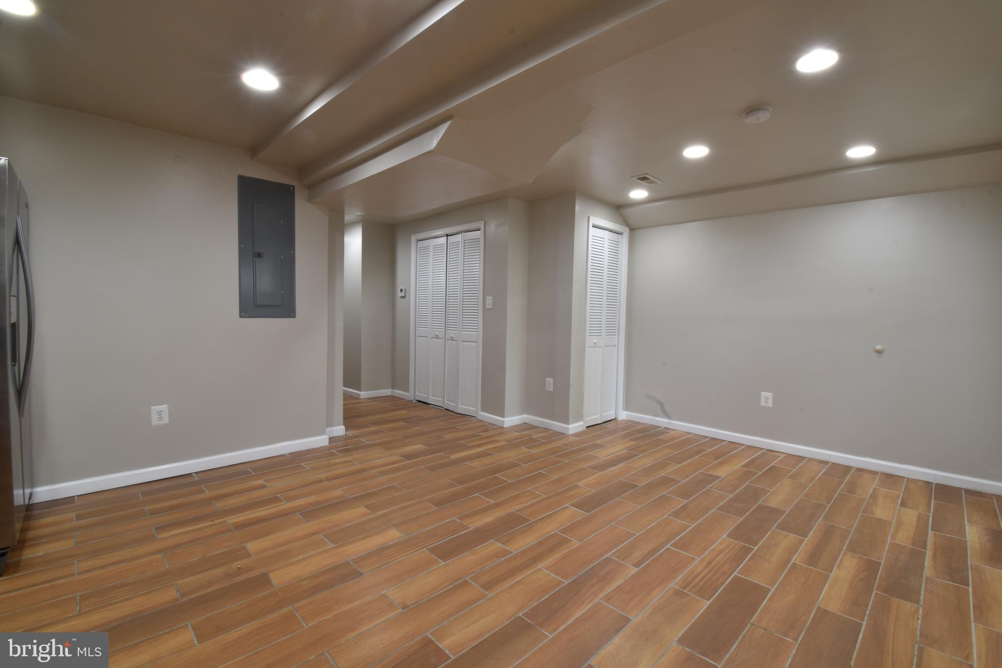 620 Princeton Place Northwest, Unit B Washington, DC 20010 - Photo 13 of 13 a view of an empty room with wooden floor