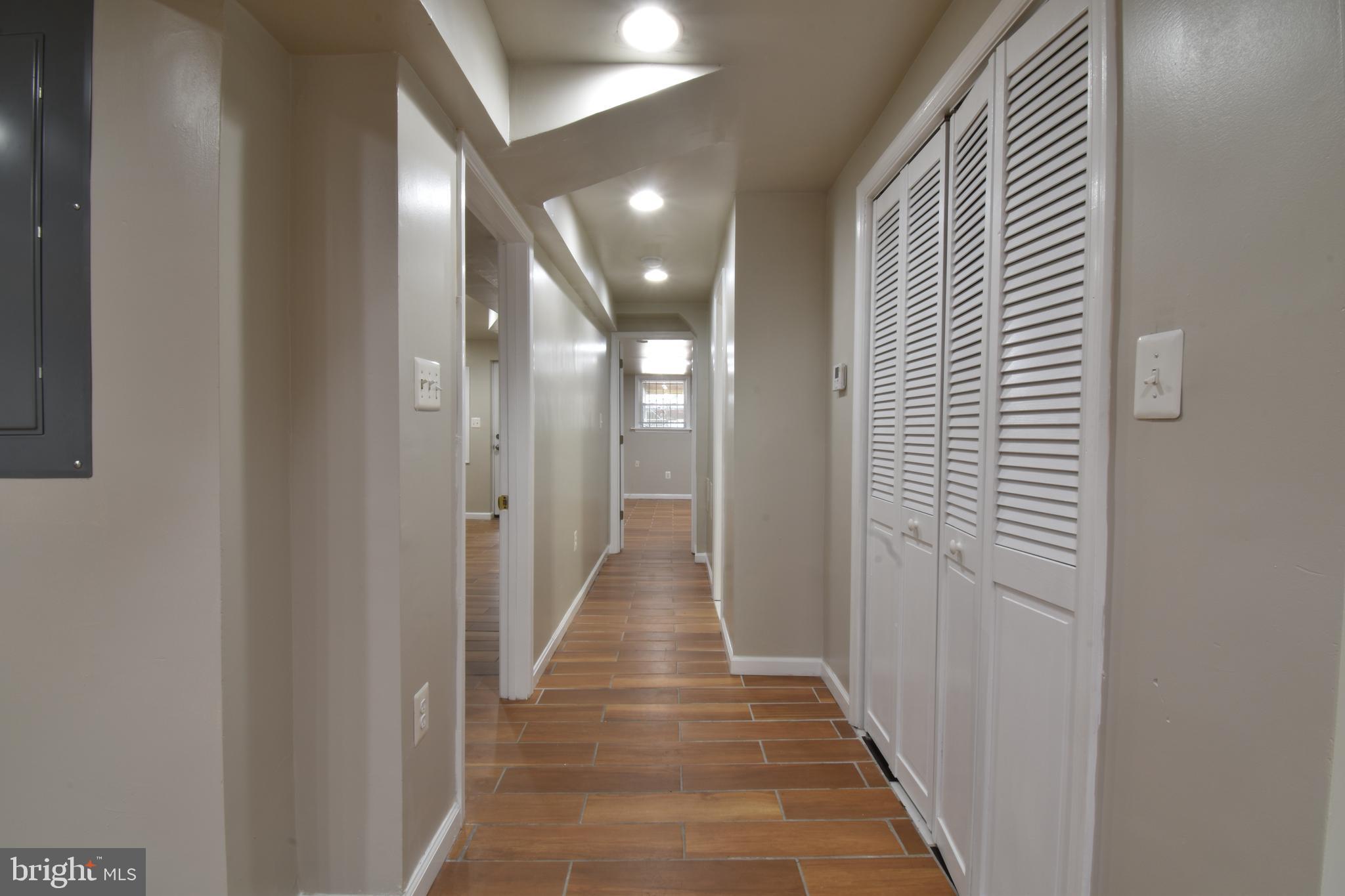 620 Princeton Place Northwest, Unit B Washington, DC 20010 - Photo 5 of 13 a view of a hallway with wooden floor