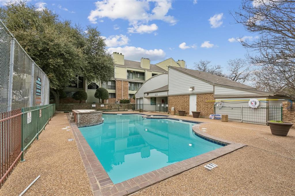 6108 Abrams Road, Unit 530 Dallas, TX 75231 - Photo 17 of 19 a view of a patio with swimming pool table and chairs