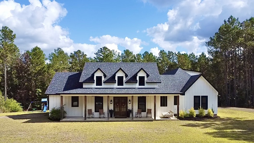 front view of house with a garden