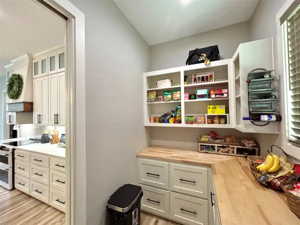 a view of kitchen center with furniture and window