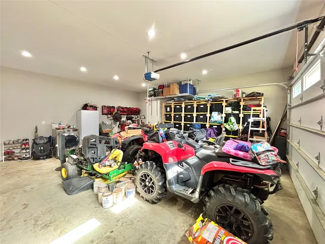 a bedroom with furniture and a bed