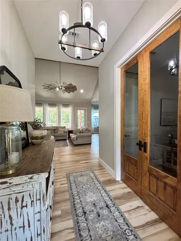 a kitchen with stainless steel appliances granite countertop a sink a counter space and cabinets