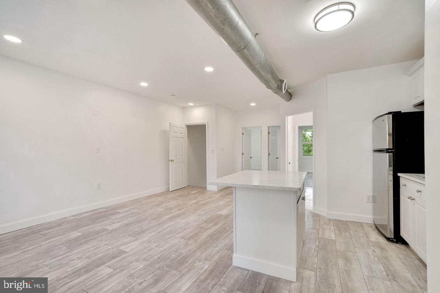 5413 Georgia Avenue Northwest Washington, DC 20011 - Photo 20 of 22 a view of kitchen with furniture and refrigerator