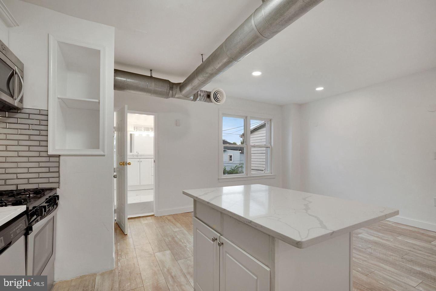5413 Georgia Avenue Northwest Washington, DC 20011 - Photo 5 of 22 a view of entryway with wooden floor